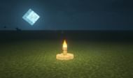Small campfire with torch (Image via Minecraft)